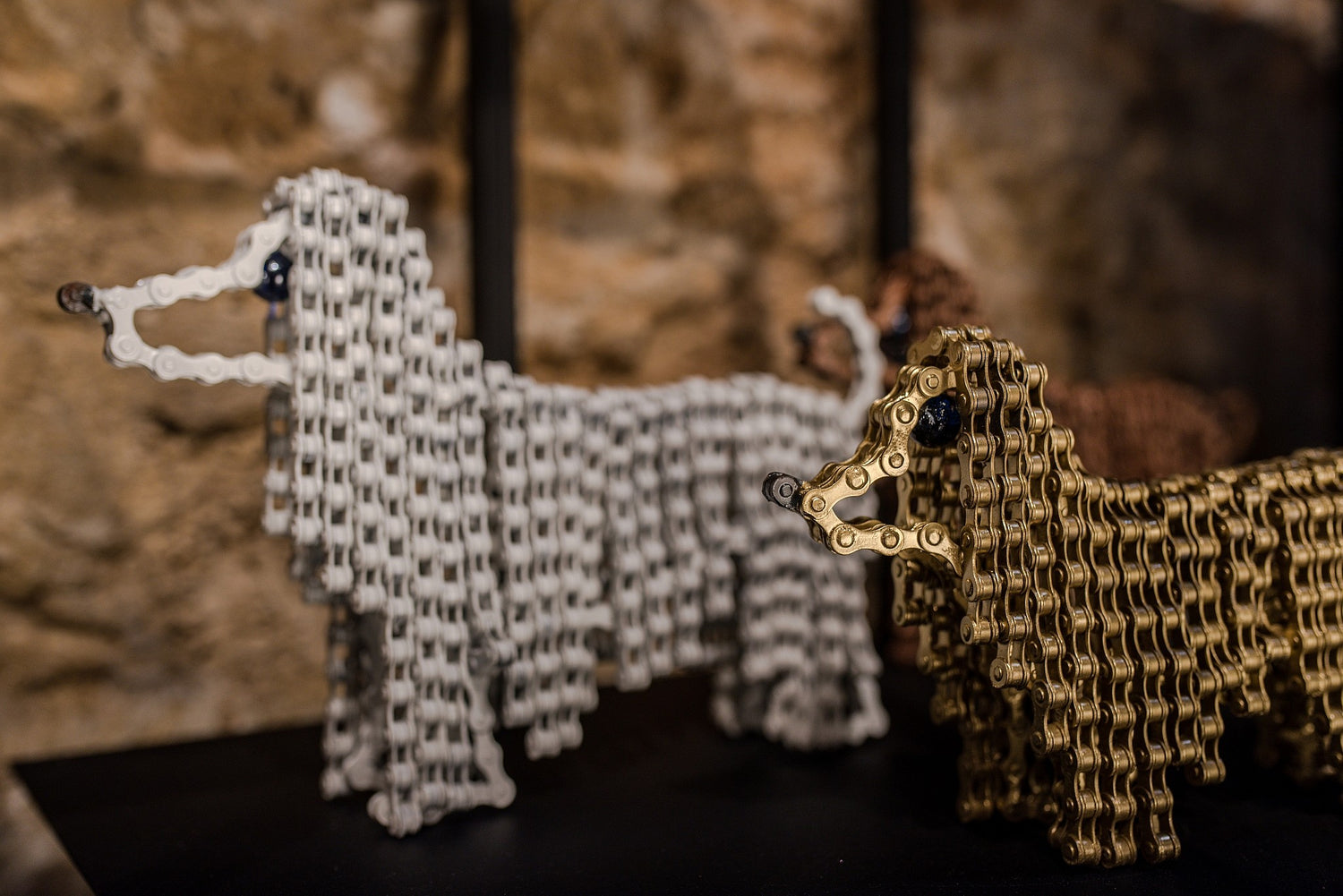 2 dogs sculpture from bike chain