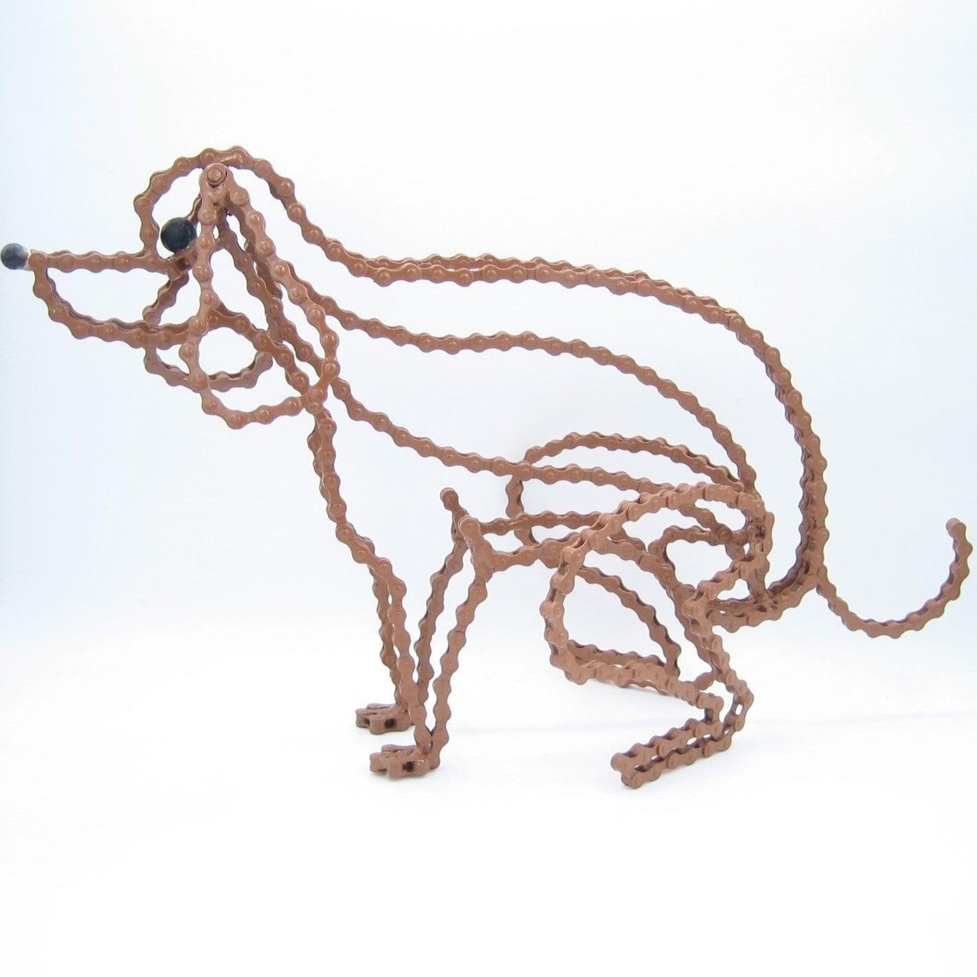 Pooping Dog Sculpture (Tuzzi) | UNCHAINED by NIRIT LEVAV PACKER